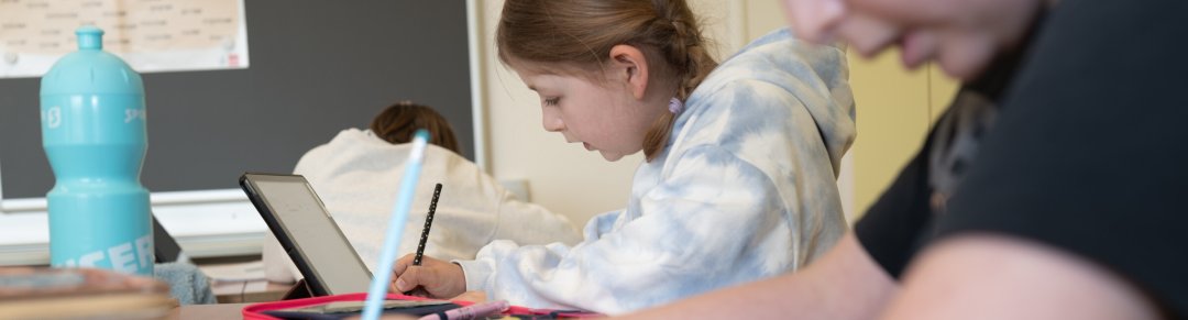 Children in the school gymnasium