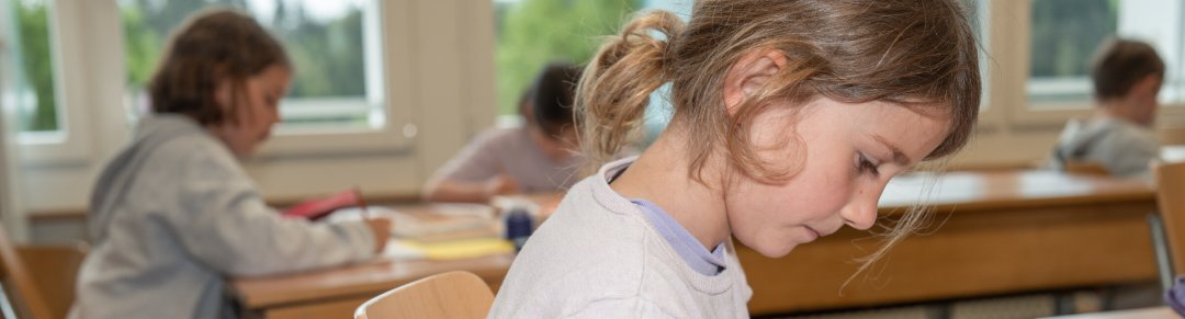 Children in the school gymnasium